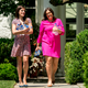 In this photo taken Friday, June 1, 2018, President Donald Trump’s personal secretary Madeleine Westerhout, left, and White House press secretary Sarah Huckabee Sanders, right, carry bottles.